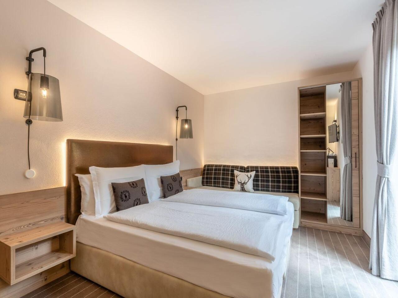 Hotel Madonnina Resort And Wellness Soraga Bagian luar foto