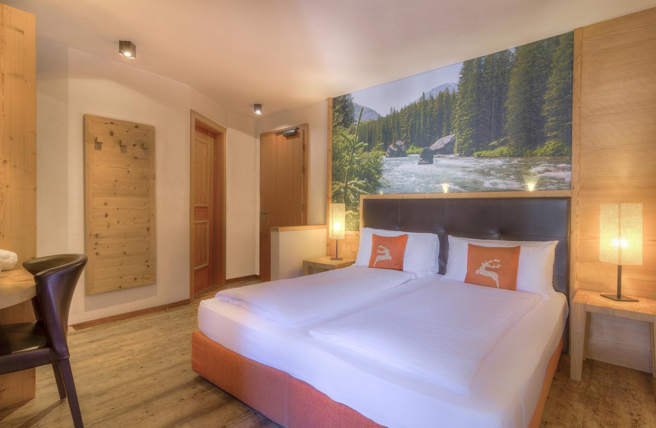 Hotel Madonnina Resort And Wellness Soraga Bagian luar foto